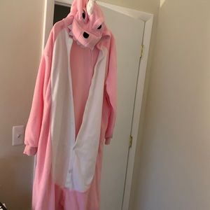 Pink dinosaur onesie